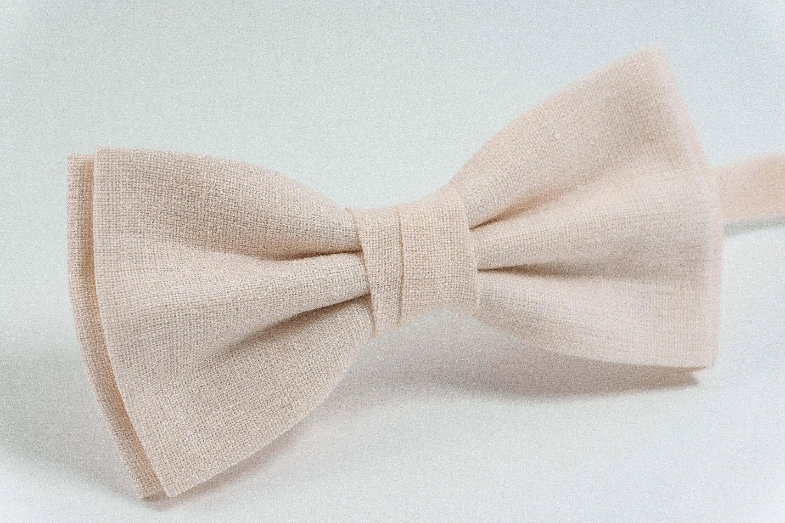 Blush peach groomsmen bow tie for weddings | Ring bearer bow tie can be matched with linen pocket square